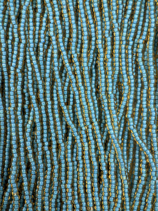 Size 11/0 Czech Glass- #492 Topaz Blue Lined