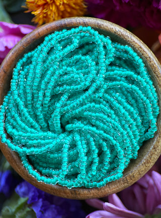 Size 11/0 Czech Glass- #1563 Crystal Intense Turquoise Lined